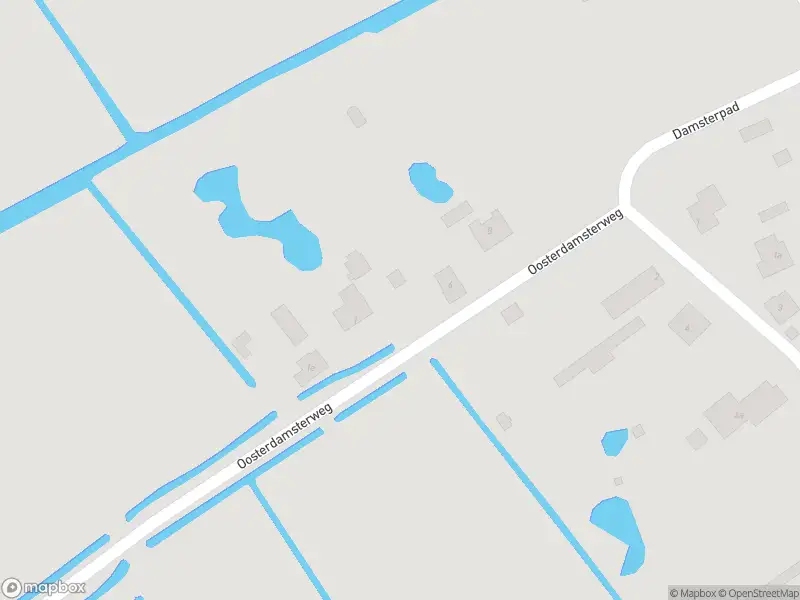 Ambulance met grote spoed naar de Oosterdamsterweg in Westerland