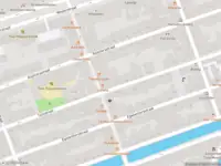 Ambulance met gepaste spoed naar de Tuinstraat in Amsterdam