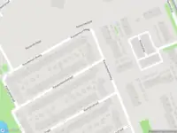 Ambulance met grote spoed naar de Kousenbandstraat in Amsterdam