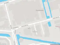 Ambulance met grote spoed naar de Achterwetering in Schoonhoven