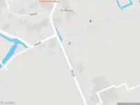 Ambulance met grote spoed naar de 't Woudt in Schipluiden