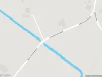 Politie naar de Scherpenzeelseweg in Wijhe vanwege voertuigen te water