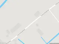 Brandweer met gepaste spoed naar de Frank van Borselenlaan in Voorhout vanwege stormschade