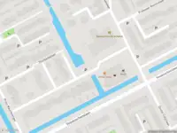 Brandweer met gepaste spoed naar de Van Hogendorplaan in Woerden vanwege stormschade