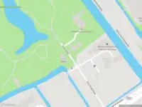 Brandweer met gepaste spoed naar de Oosterbeek in Wassenaar vanwege stormschade