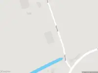 Politie naar de Spuiweg in Piershil vanwege voertuigen te water