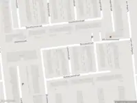 Ambulance met grote spoed naar de Leuvenstraat in Haarlem