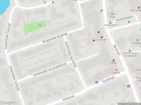 Ambulance met grote spoed naar de Burgemeester Swartstraat in Oostzaan