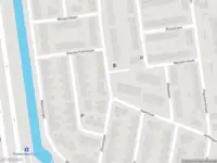 Ambulance met grote spoed naar de Iepenlaan in Schiedam