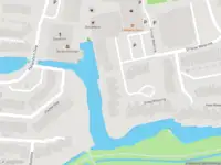 Ambulance met grote spoed naar de Grote Wetering in Zaandam