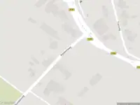 Ambulance met grote spoed naar de Kasteelweg in Baexem