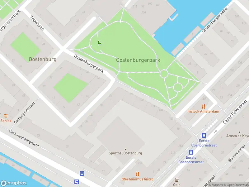 Ambulance met gepaste spoed naar de Oostenburgerpark in Amsterdam