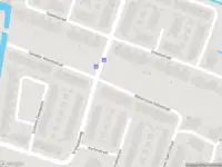 Ambulance met gepaste spoed naar de Steve Bikostraat in Haarlem