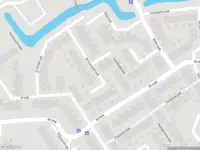 Ambulance met gepaste spoed naar de Kreek in Spijkenisse