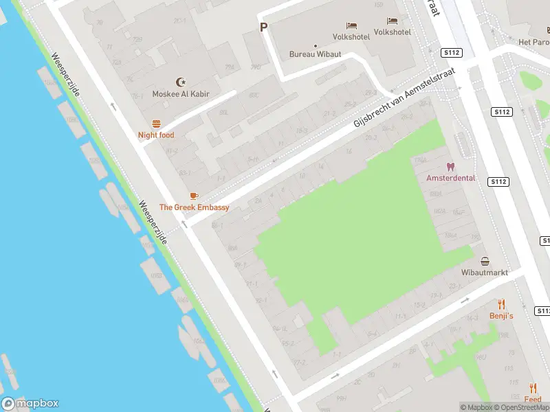 Ambulance met gepaste spoed naar de Burmandwarsstraat in Amsterdam