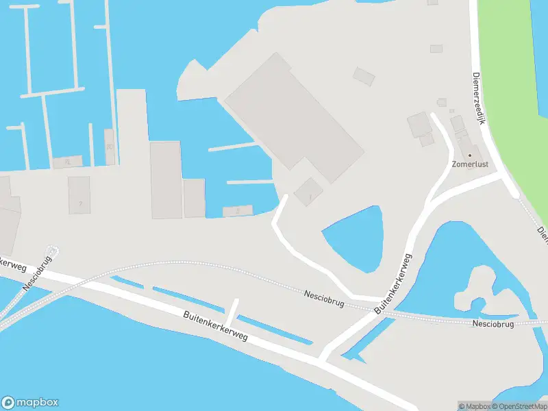 Ambulance met grote spoed naar de Buitenkerkerweg in Amsterdam