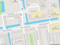 Ambulance met grote spoed naar de P.C. Bothstraat in Gouda