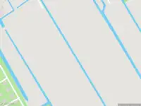 Ambulance met gepaste spoed naar de Vrouwenweg in Leiden