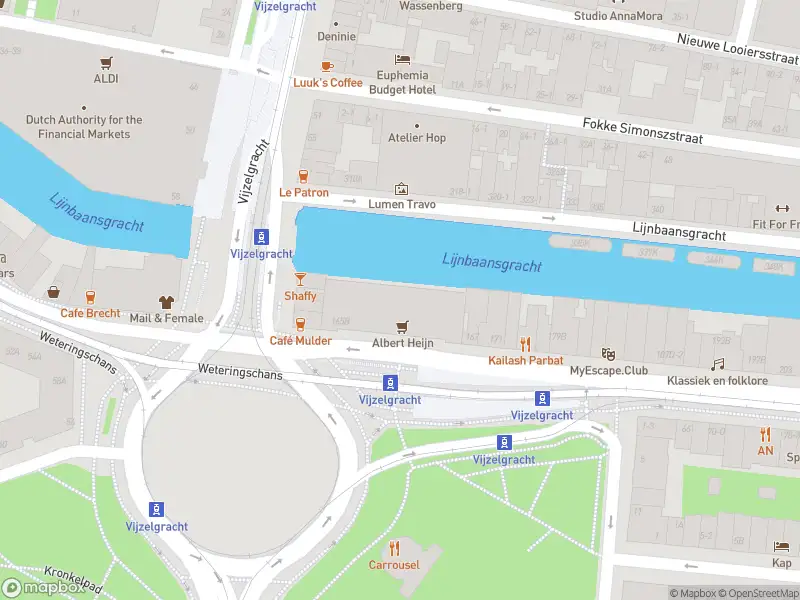 Ambulance met grote spoed naar de Kleine-Gartmanplantsoen in Amsterdam