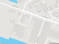 Ambulance met gepaste spoed naar de Eemhavenweg in Rotterdam