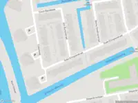 Brandweer met gepaste spoed naar de Ann Burtonstraat in Leiden vanwege stankoverlast