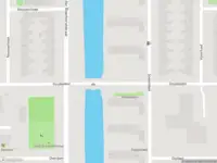 Ambulance met grote spoed naar de Noordhollandstraat in Amsterdam