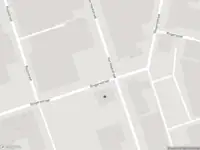 Ambulance met gepaste spoed naar de Ringersstraat in Schiedam