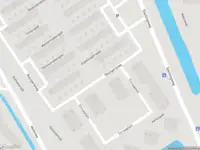 Ambulance met gepaste spoed naar de Marskramerstraat in Amsterdam