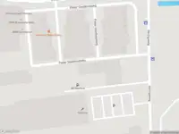 Ambulance met grote spoed naar de Heringaweg in Haarlem