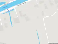 Brandweer met gepaste spoed naar de Utrechtsestraatweg in Harmelen vanwege stormschade