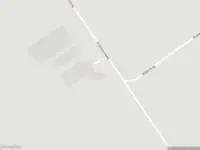 Brandweer met gepaste spoed naar de Noordelijke Meentsteeg in Rhenen vanwege stormschade