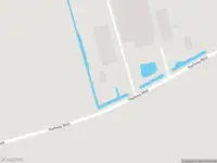 Ambulance met grote spoed naar de Hoefweg West in Giessenburg