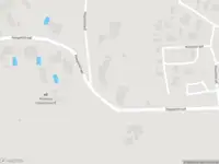 Brandweer met gepaste spoed naar de Haspelstraat in Hoeven vanwege stormschade