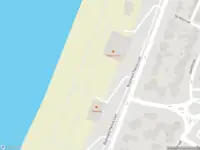 Brandweer met gepaste spoed naar de Strandafgang Paulus Loot in Zandvoort