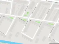 Ambulance met gepaste spoed naar de Brediusstraat in Amsterdam