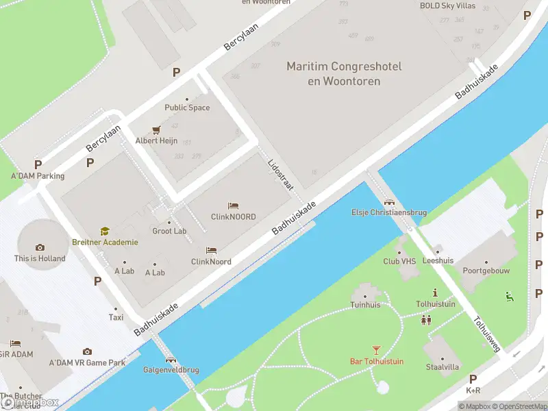 Ambulance met gepaste spoed naar de Badhuiskade in Amsterdam