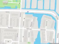 Ambulance met grote spoed naar de Roggetiende in Lekkerkerk