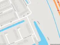 Ambulance met grote spoed naar de Prof. Hoogewerfflaan in Delft