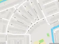 Ambulance met gepaste spoed naar de Kaarsenmakerhof in Schiedam