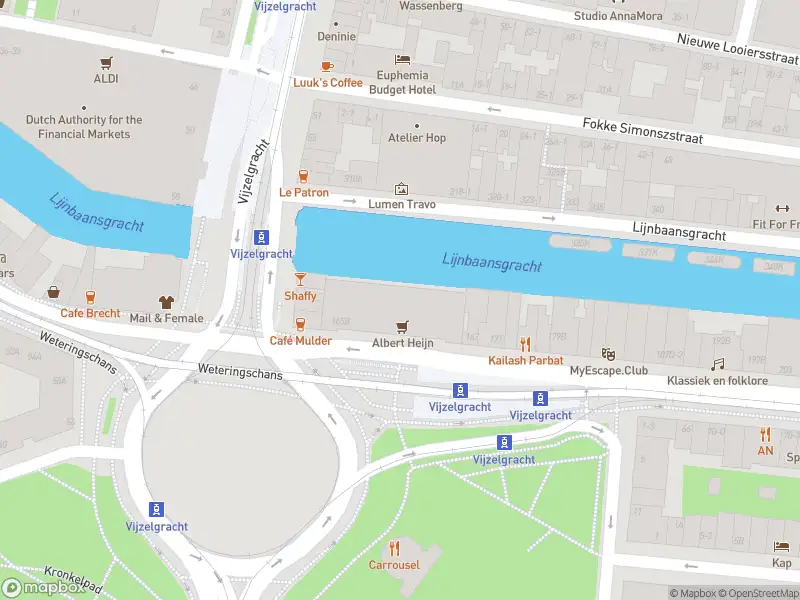 Ambulance met gepaste spoed naar de Lange Leidsedwarsstraat in Amsterdam