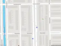 Ambulance met grote spoed naar de Hechtelstraat in Amsterdam