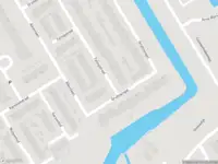 Ambulance met grote spoed naar de Talingstraat in Capelle aan den IJssel