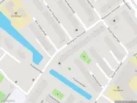 Ambulance met gepaste spoed naar de Monseigneur Nolenslaan in Schiedam