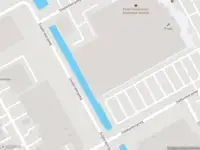 Ambulance met gepaste spoed naar de Schepenbergweg in Amsterdam