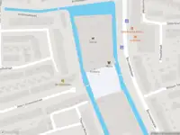 Ambulance met grote spoed naar de Leonardo da Vinciplein in Haarlem