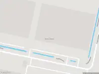 Ambulance met grote spoed naar de Kaapstadweg in Amsterdam