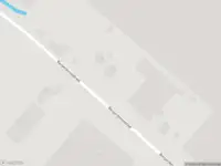 Politie naar de Bergerdensestraat in Huissen vanwege voertuigen te water