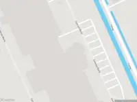 Brandweer met grote spoed naar de Centrale Markt in Zwaagdijk-Oost vanwege gebouwbrand