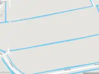 Brandweer met grote spoed naar de Zeedijk in Assendelft vanwege voertuigen te water