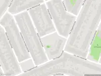 Ambulance met grote spoed naar de Justus van Maurikstraat in Haarlem